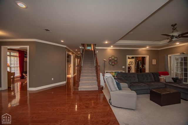 living room featuring baseboards, recessed lighting, crown molding, a ceiling fan, and visible vents