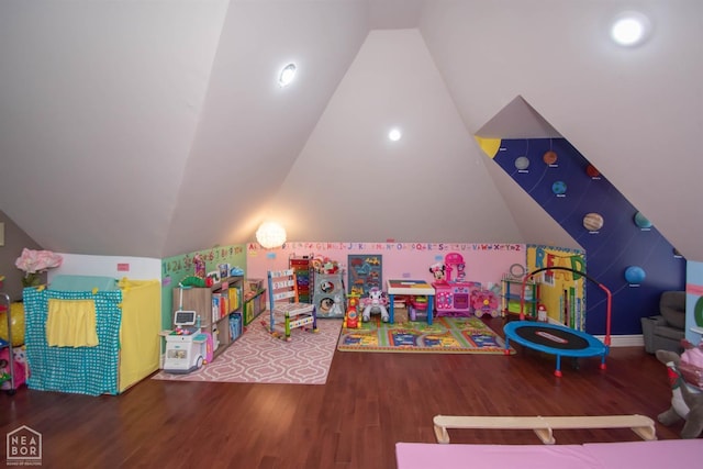 game room featuring wood finished floors and lofted ceiling