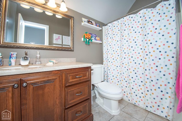 full bath with toilet, tile patterned floors, curtained shower, and vanity