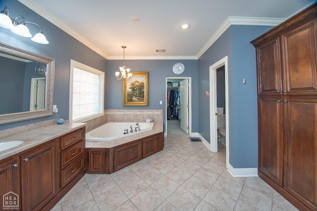 bathroom featuring crown molding, an inviting chandelier, a bath, vanity, and toilet