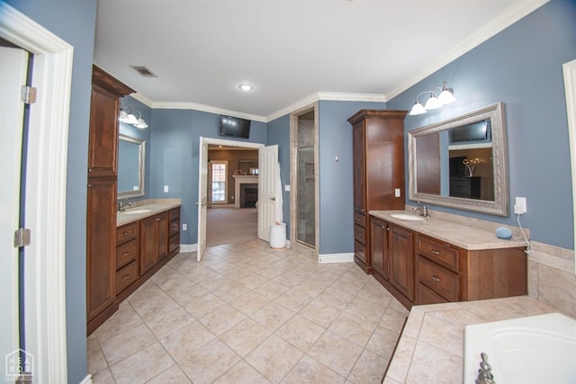 full bathroom with vanity, baseboards, crown molding, a shower stall, and visible vents