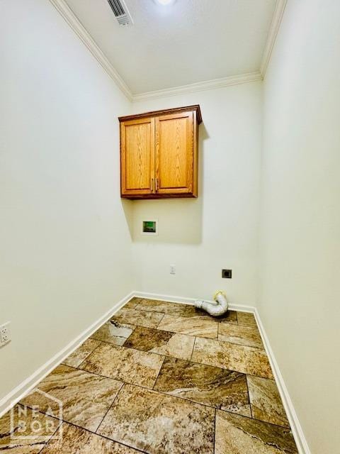 3803 Stone Ridge Dr, Paragould, AR 72450 - laundry room with cabinet space, hookup for an electric dryer, ornamental molding, stone finish flooring, and baseboards