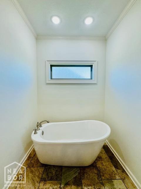 3803 Stone Ridge Dr, Paragould, AR 72450 - full bathroom featuring a freestanding bath, crown molding, baseboards, and recessed lighting