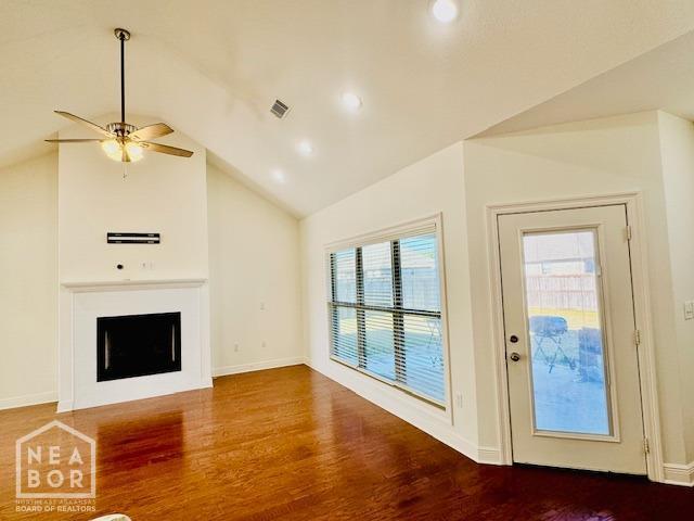 3803 Stone Ridge Dr, Paragould, AR 72450 - unfurnished living room featuring wood finished floors, a ceiling fan, baseboards, recessed lighting, and a fireplace