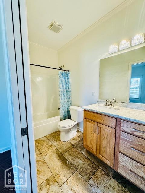 3803 Stone Ridge Dr, Paragould, AR 72450 - full bath featuring vanity, toilet, shower / bath combo with shower curtain, and ornamental molding