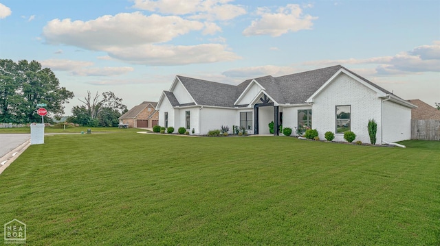 3604 Fieldstone Dr, Paragould, AR 72450 - view of front of property featuring a front lawn and a shingled roof