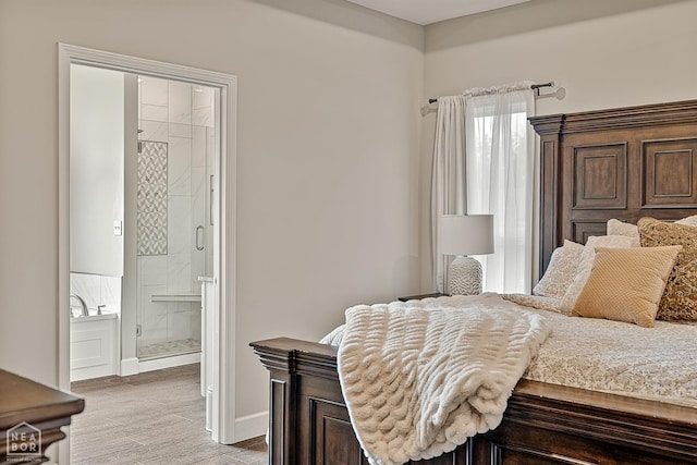 3604 Fieldstone Dr, Paragould, AR 72450 - bedroom with ensuite bathroom and light wood-style floors