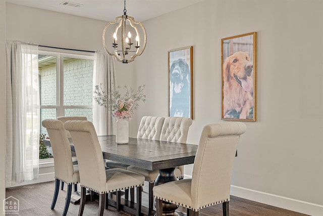 3604 Fieldstone Dr, Paragould, AR 72450 - dining area featuring a chandelier and wood finished floors
