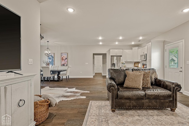 3604 Fieldstone Dr, Paragould, AR 72450 - living area with recessed lighting, a chandelier, and wood finished floors