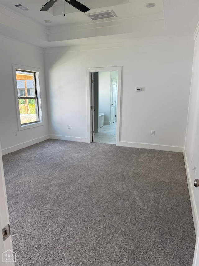 3101 Bear Creek Cv, Jonesboro, AR 72404 - carpeted empty room with ornamental molding, a tray ceiling, and ceiling fan