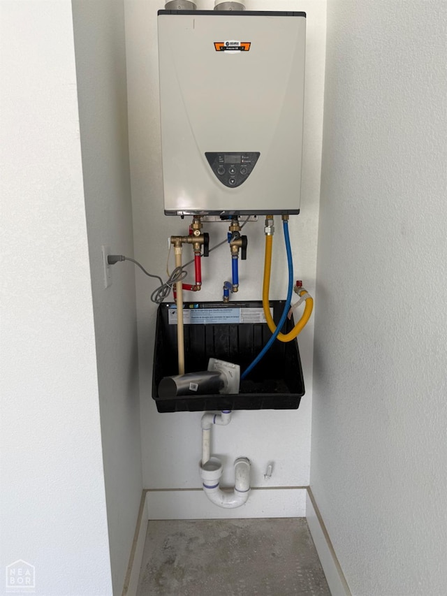 3101 Bear Creek Cv, Jonesboro, AR 72404 - detailed view of tankless water heater and concrete flooring