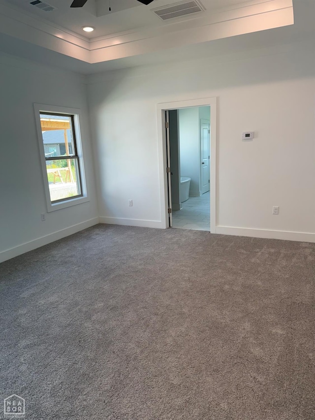 3101 Bear Creek Cv, Jonesboro, AR 72404 - carpeted empty room with crown molding, a ceiling fan, and a raised ceiling