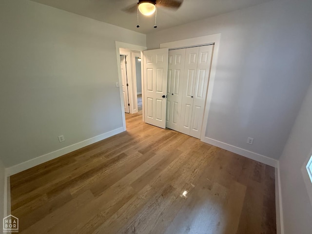 2408 Harper St, Corning, AR 72422 - unfurnished bedroom with light wood-style flooring, a closet, and ceiling fan
