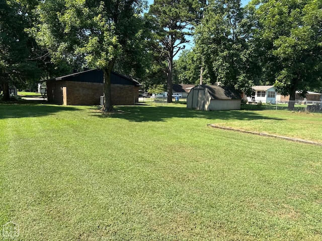 2408 Harper St, Corning, AR 72422 - view of yard with a storage unit