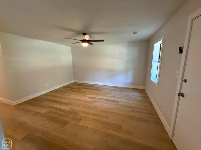 2408 Harper St, Corning, AR 72422 - empty room with a ceiling fan and light wood-style floors