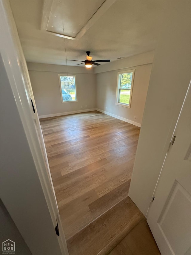 2408 Harper St, Corning, AR 72422 - unfurnished room featuring attic access, healthy amount of natural light, and light wood-style flooring
