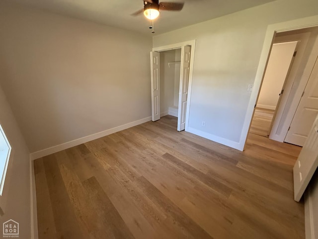 2408 Harper St, Corning, AR 72422 - unfurnished bedroom featuring light wood-style floors, a closet, and ceiling fan