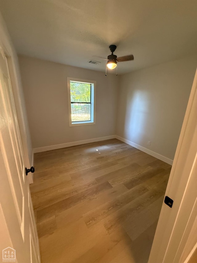 2408 Harper St, Corning, AR 72422 - empty room featuring wood finished floors and a ceiling fan
