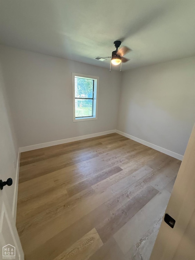 2408 Harper St, Corning, AR 72422 - unfurnished room featuring wood finished floors and a ceiling fan