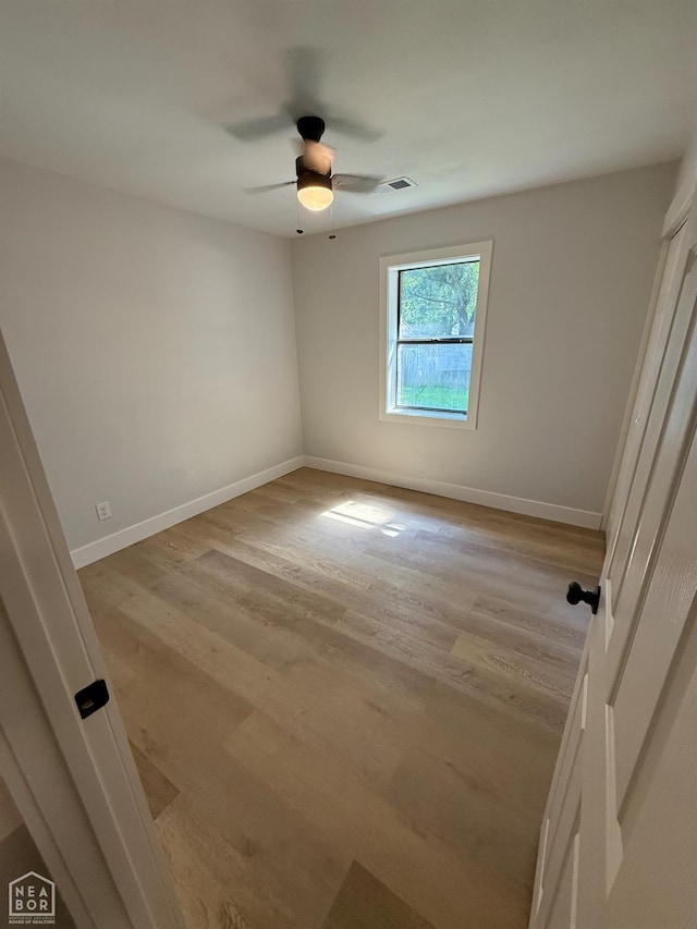 2408 Harper St, Corning, AR 72422 - spare room featuring a ceiling fan and light wood-type flooring