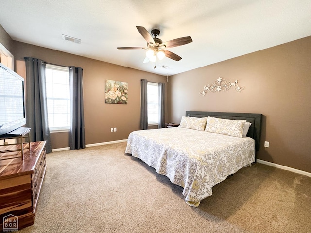 2311 Bridger Rd, Jonesboro, AR 72405 - carpeted bedroom with multiple windows and ceiling fan