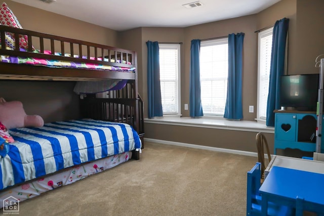 2311 Bridger Rd, Jonesboro, AR 72405 - bedroom with multiple windows and carpet