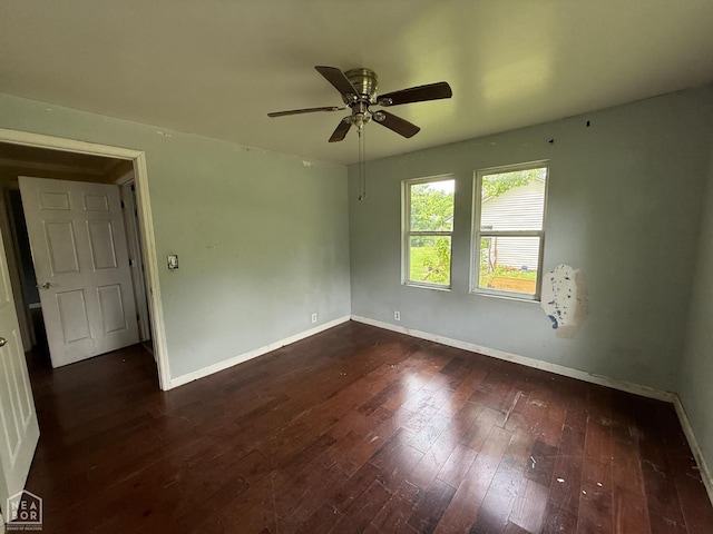 414 E 1st St, Rector, AR 72461 - empty room with baseboards, ceiling fan, and dark wood finished floors