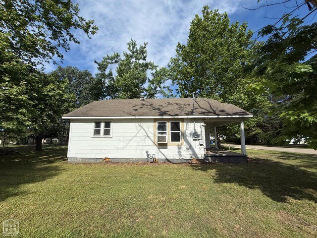 414 E 1st St, Rector, AR 72461 - back of property with a lawn