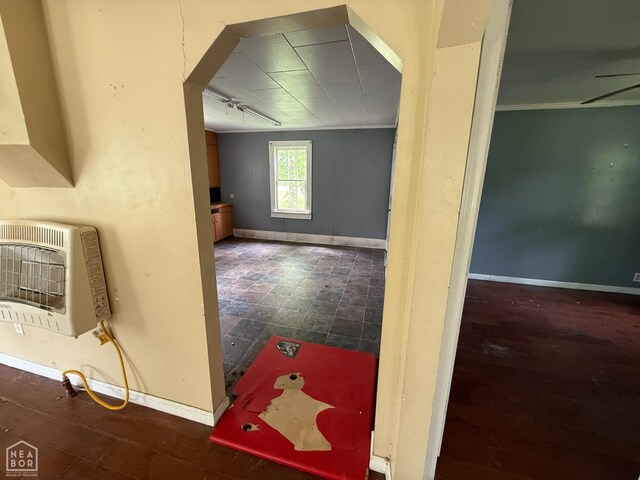 414 E 1st St, Rector, AR 72461 - corridor with heating unit, baseboards, and ornamental molding