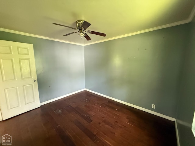 414 E 1st St, Rector, AR 72461 - unfurnished room with dark wood-style flooring, ceiling fan, ornamental molding, and baseboards