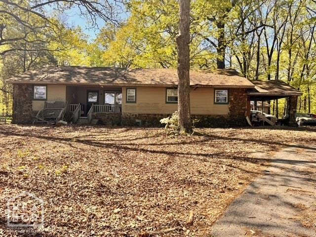 1405 Arrowhead Farm Rd, Jonesboro, AR 72401 - view of front of property featuring a porch and a carport