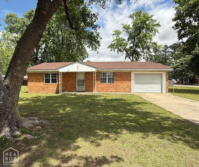 ranch-style house featuring a front lawn, brick siding, driveway, and a garage