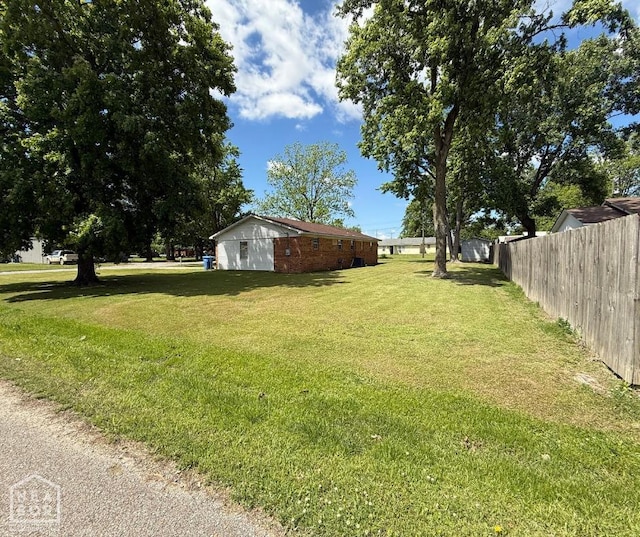 view of yard with fence