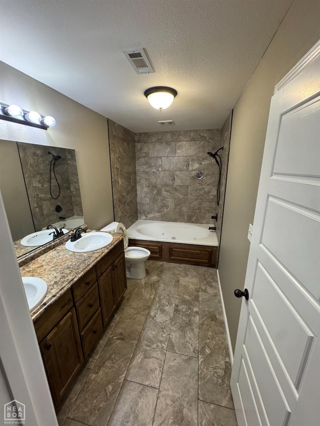 206 Gavin Dr, Paragould, AR 72450 - full bath with tub / shower combination, double vanity, and a textured ceiling