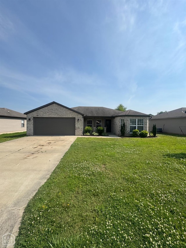 206 Gavin Dr, Paragould, AR 72450 - single story home with a garage, driveway, a front lawn, and brick siding