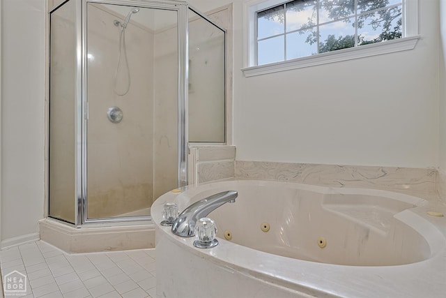 4604 Stillwater, Jonesboro, AR 72404 - full bathroom featuring tile patterned floors, a stall shower, and a jetted tub