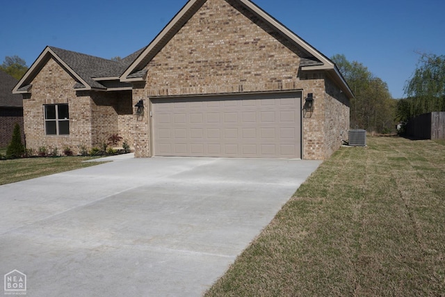 4312 Trailwater Dr, Jonesboro, AR 72404 - view of front of property featuring brick siding, central air condition unit, driveway, a front lawn, and an attached garage