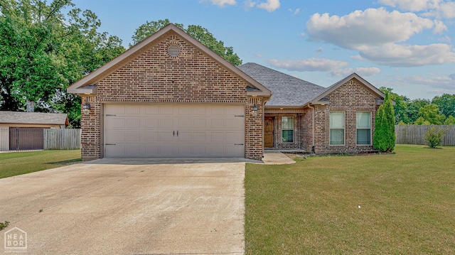 4317 Cypress Pointe Ln, Jonesboro, AR 72405 - view of front of home with brick siding, concrete driveway, an attached garage, and roof with shingles