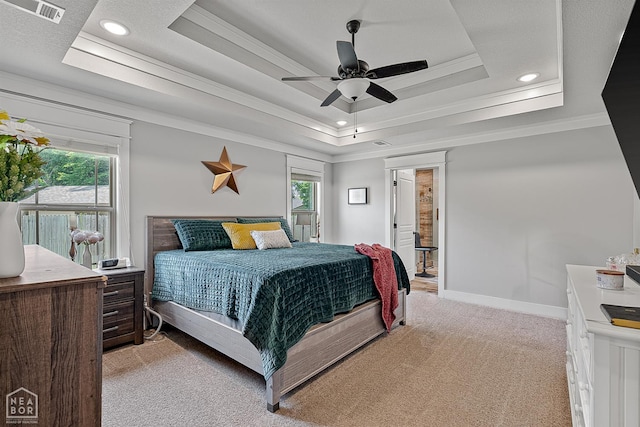 4317 Cypress Pointe Ln, Jonesboro, AR 72405 - bedroom featuring a raised ceiling, light colored carpet, crown molding, multiple windows, and recessed lighting