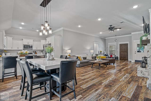 4317 Cypress Pointe Ln, Jonesboro, AR 72405 - dining room featuring ceiling fan, recessed lighting, dark wood-type flooring, and crown molding