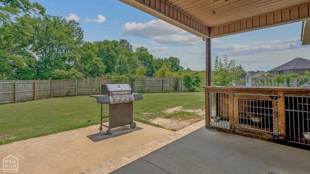 4317 Cypress Pointe Ln, Jonesboro, AR 72405 - fenced backyard with a patio and grilling area