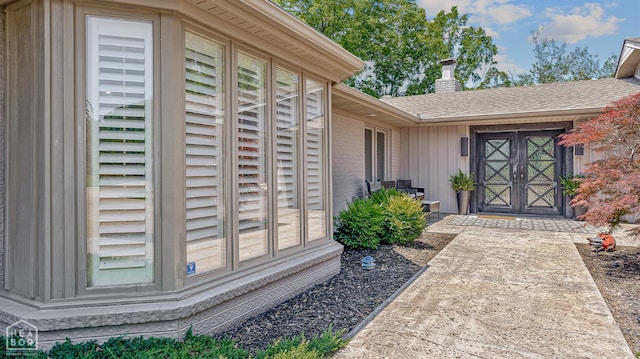 106 Winston Pl, Paragould, AR 72450 - doorway to property featuring board and batten siding and a chimney