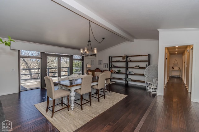 106 Winston Pl, Paragould, AR 72450 - dining room featuring a chandelier, wood finished floors, and baseboards