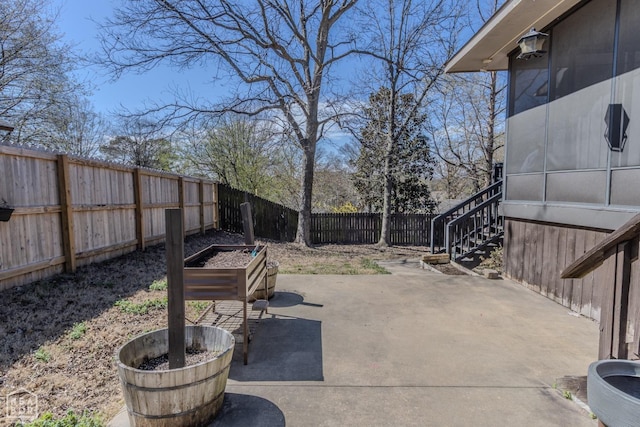106 Winston Pl, Paragould, AR 72450 - fenced backyard featuring a patio and stairs