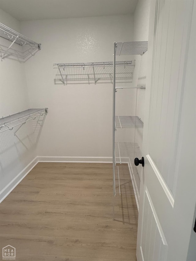 5709 Morgan Dr, Jonesboro, AR 72401 - spacious closet with wood finished floors