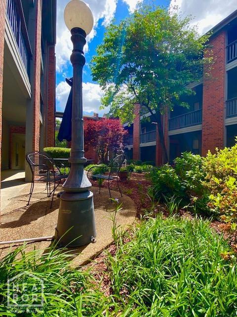 1300 S Church St, Jonesboro, AR 72401 - surrounding community featuring a patio area