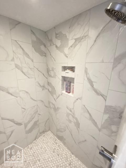 1300 S Church St, Jonesboro, AR 72401 - full bathroom featuring a tile shower
