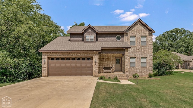 704 S Main St, Harrisburg, AR 72432 - view of front facade featuring a front yard, brick siding, driveway, and an attached garage