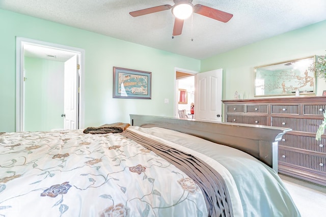 1207 Hunters Run Cv, Jonesboro, AR 72401 - bedroom featuring ceiling fan and a textured ceiling