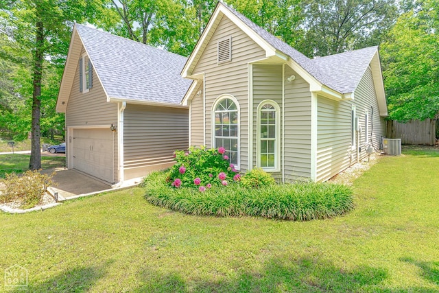 1207 Hunters Run Cv, Jonesboro, AR 72401 - view of front facade featuring a shingled roof, an attached garage, central air condition unit, and concrete driveway